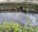 Outlet dari sawah Jl. Akordion